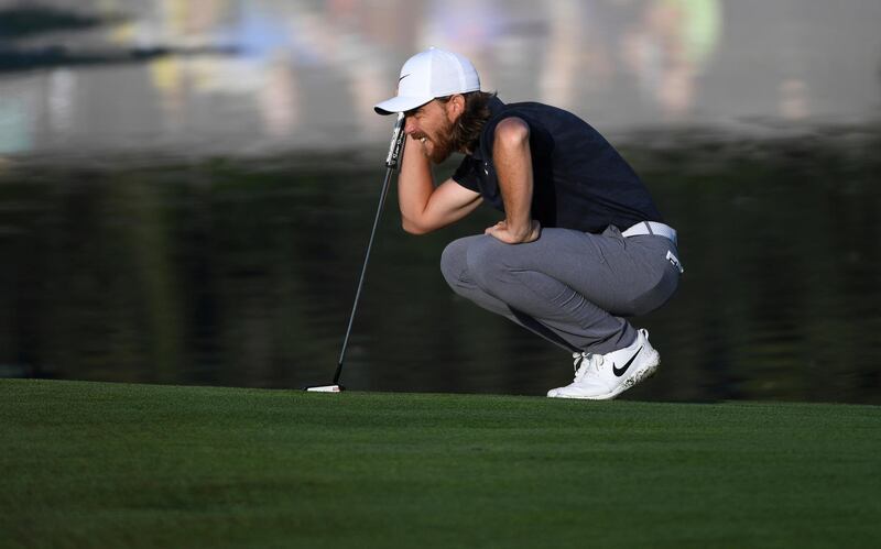 Tommy Fleetwood of England lines up a putt on the 12th green in round one of the Abu Dhabi Championship golf tournament in Abu Dhabi, United Arab Emirates, Wednesday, Jan. 16, 2019. (AP Photo/Martin Dokoupil)