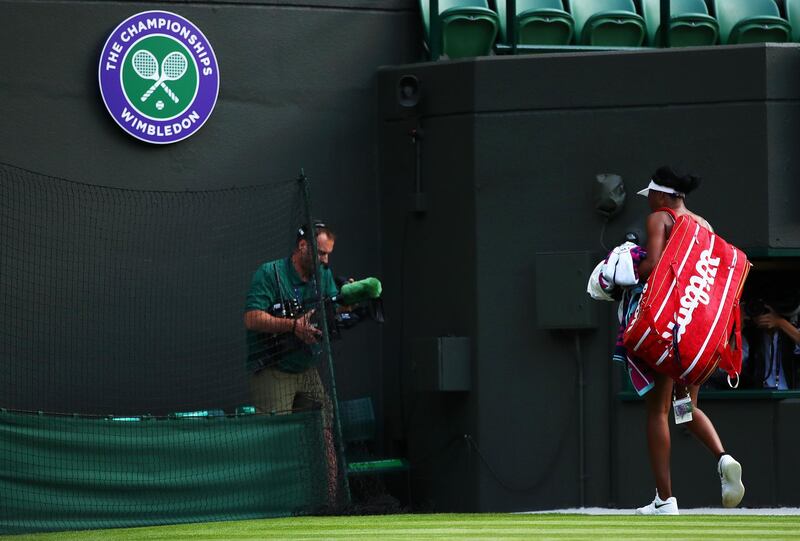 Williams leaves the court following defeat. Getty Images