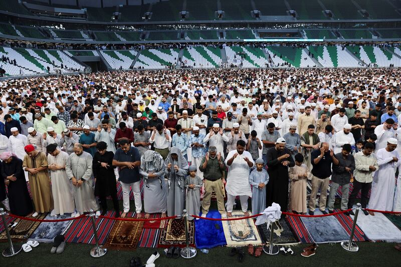 Worshippers attend Eid Al Fitr prayers at Education City Stadium in Al Rayyan, Qatar. Reuters
