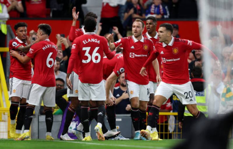 Jadon Sancho and his teammates celebrate at Old Trafford. Getty