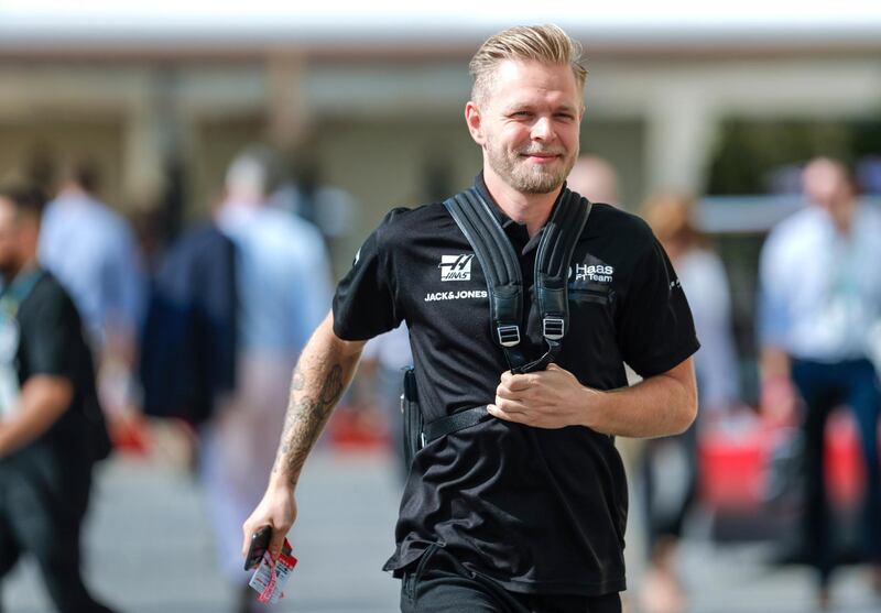 Abu Dhabi, United Arab Emirates, November 29, 2019.  
Formula 1 Etihad Airways Abu Dhabi Grand Prix.
--  Kevin Magnussen of Haas F1 Team tries to outrun the media as he arrives at the track.
Victor Besa / The National
Section:  SP
Reporter:  Simon Wilgress-Pipe