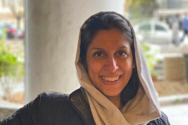 In this photo released by her family, British-Iranian aid worker, Nazanin Zaghari-Ratcliffe, poses for a photo after she was released from house arrest in Tehran, Iran, Sunday, March 7, 2021. The supporters of a British-Iranian woman detained for five years in Iran said March 14, 2021, that she has returned to court on fresh charges. The development casts uncertainty over her future following her release from prison last week. (Zaghari family via AP, File)