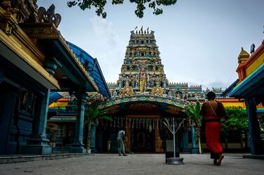 The Kathiresan Temple, a rising structure adorned with Hindu iconography and lotus flowers, in Bambalapitiya, Colombo. Jack Moore/The National