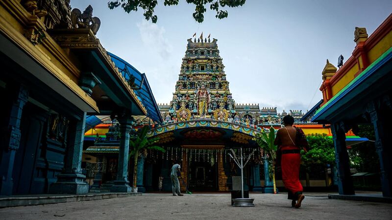 The Kathiresan Temple, a rising structure adorned with Hindu iconography and lotus flowers, in Bambalapitiya, Colombo. Jack Moore/The National