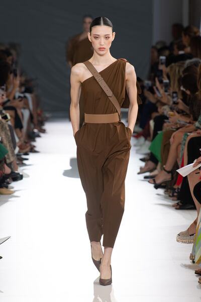 Max Mara has crafted a one-shoulder number in bitter chocolate. Courtesy Max Mara