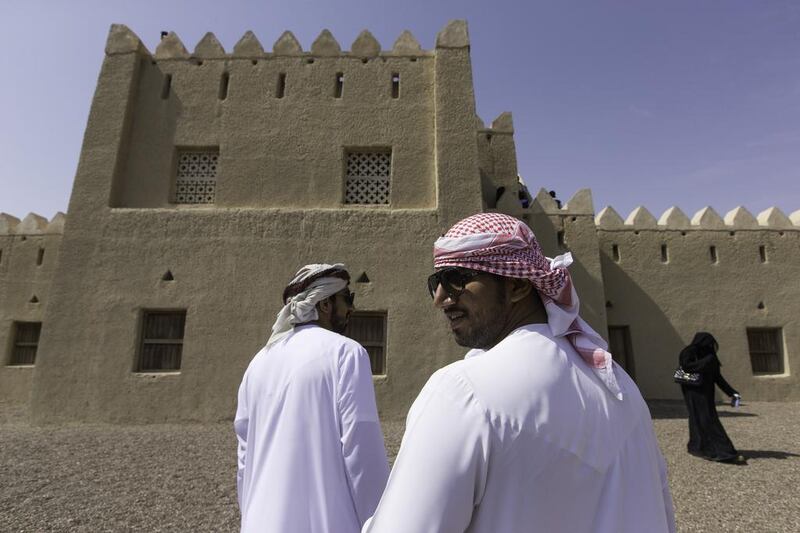 Emiratis visit the Bin Hamoodah Al Dhaheri house on the edge of Al Jimi Oasis during the first My Old House tour.