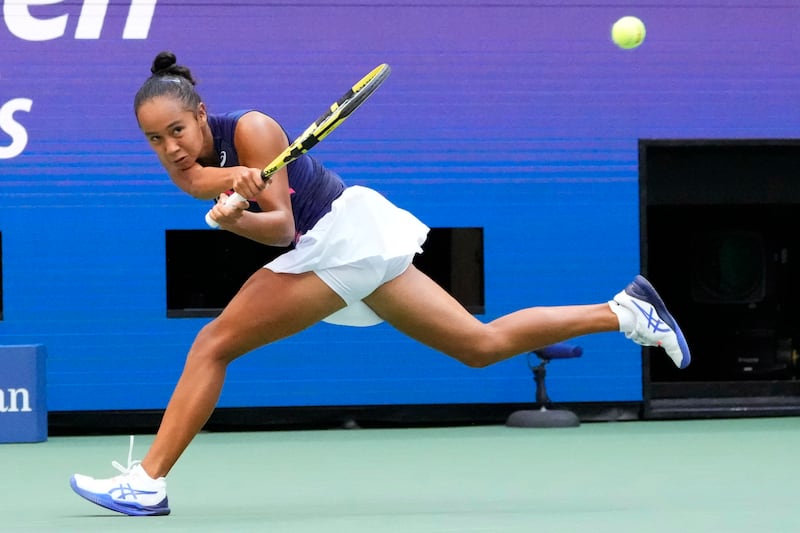 Leylah Fernandez of Canada hits a backhand against Emma Raducanu of Great Britain. Reuters