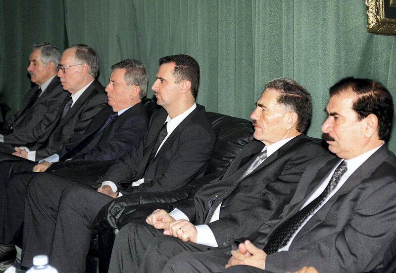 (FILES) In this file handout photo provided by the Syrian Arab News Agency SANA on June 14, 2000, (From R to L) then Syrian vice-president Zuheir Masharqa, deputy secretary General of the Syrian Baath Party Abdallah al-Ahmar, Syrian heir apparent Bashar al-Assad, vice-president Abdel Halim Khaddam, parliament speaker Abdel Qader Qadura and Baath Party senior member, Suleiman Qaddah, sit during condolences in the Assads' hometown of Qerdaha in northern Syria. - President Bashar al-Assad, whose family has ruled Syria for over half a century, faces an election this week meant to cement his image as the only hope for recovery in the war-battered country, analysts say. (Photo by - / SANA / AFP) / == RESTRICTED TO EDITORIAL USE - MANDATORY CREDIT "AFP PHOTO / HO / SANA" - NO MARKETING NO ADVERTISING CAMPAIGNS - DISTRIBUTED AS A SERVICE TO CLIENTS ==