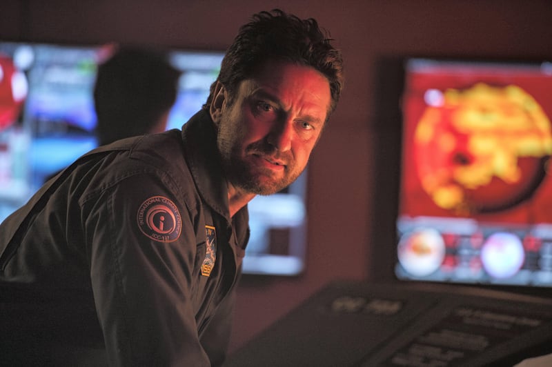 Gerard Butler plays scientist Jake Lawson, who creates a high-tech satellite system to control the weather. Courtesy Warner Bros