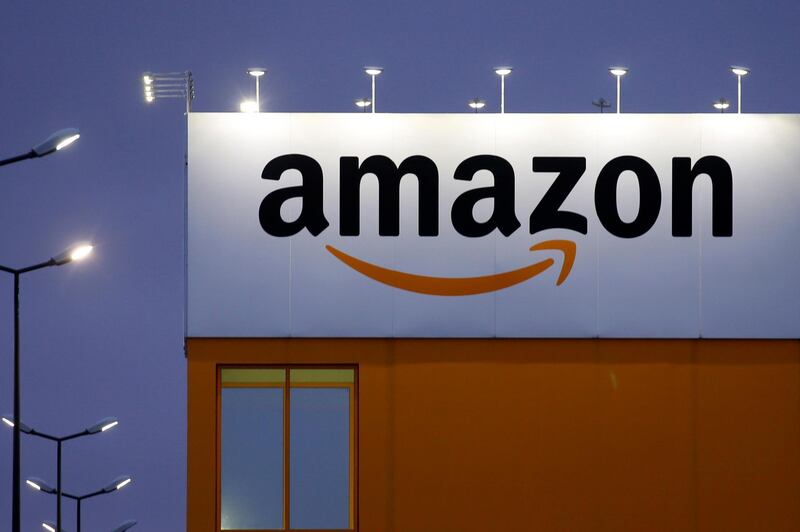 FILE PHOTO: The logo of Amazon is seen at the company logistics center in Lauwin-Planque, northern France, February 20, 2017. REUTERS/Pascal Rossignol/File Photo