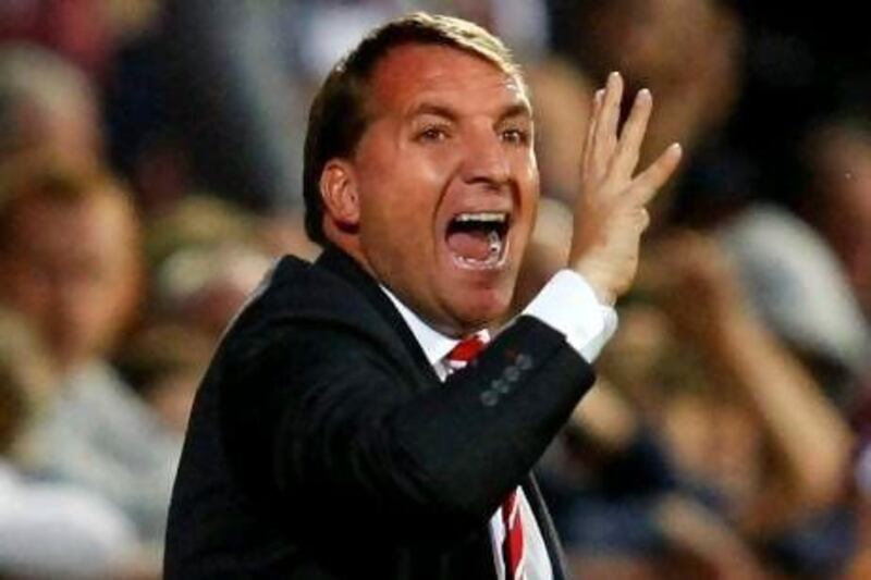 Brendan Rodgers faces many challenges as Liverpool manager, such as getting his squad right. David Moir / Reuters
