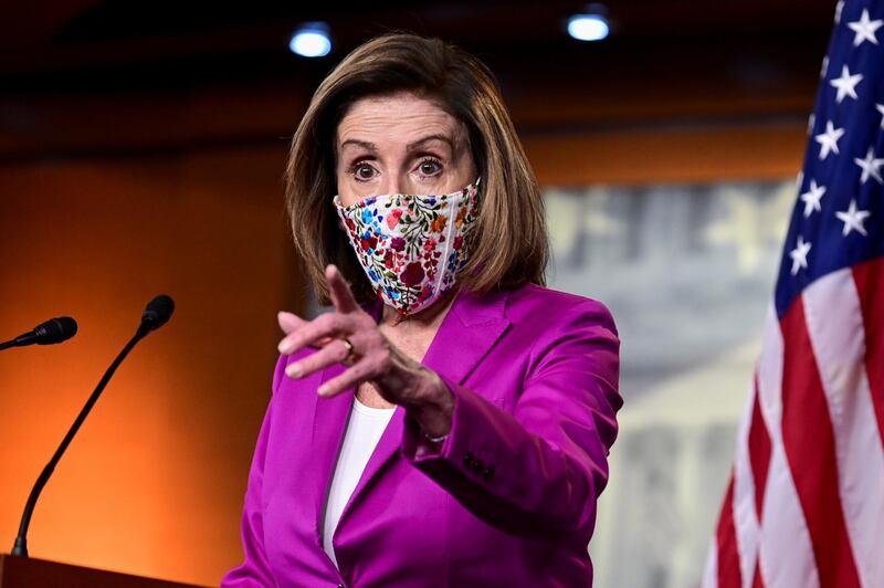 U.S. House Speaker Nancy Pelosi (D-CA) speaks to reporters a day after supporters of U.S. President Donald Trump occupied the Capitol, during a news conference in Washington, U.S., January 7, 2021. REUTERS/Erin Scott 