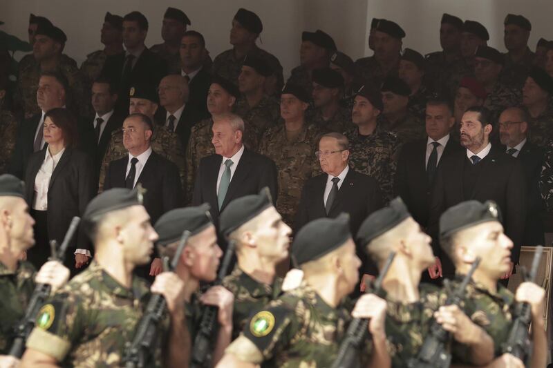 Mr. Hariri, Mr. Aoun, Mr. Berri, Mr. Saab and Ms. Hassan attend a military parade. AP Photo