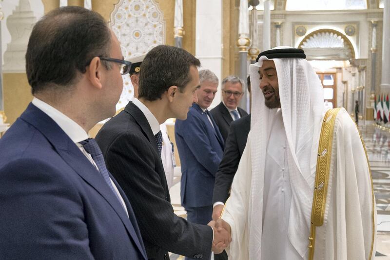 ABU DHABI, UNITED ARAB EMIRATES - November 15, 2018: HH Sheikh Mohamed bin Zayed Al Nahyan Crown Prince of Abu Dhabi Deputy Supreme Commander of the UAE Armed Forces (R), greets a delegation member accompanying HE Giuseppe Conte, Prime Minister of Italy (not shown), during a reception held at the Presidential Palace. 

( Hamad Al Kaabi / Ministry of Presidential Affairs )?
---