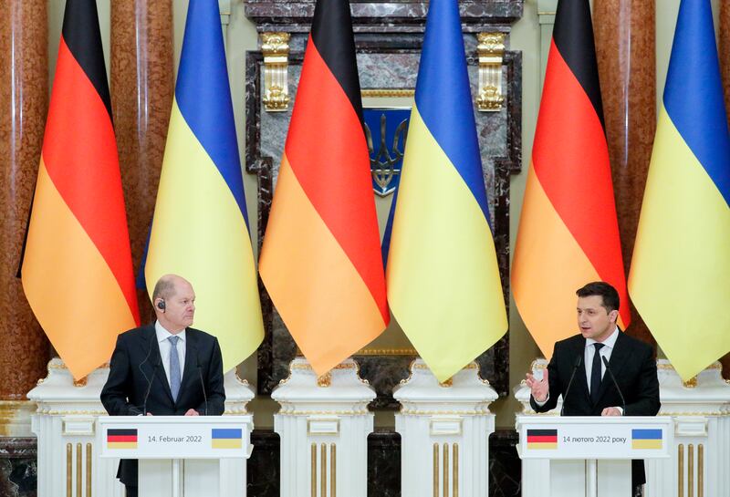 German Chancellor Olaf Scholz speaks to Ukrainian President Volodymyr Zelenskiy in Kiev on Monday. EPA