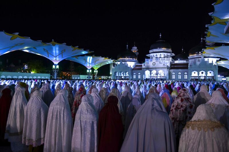 Indonesian Muslims pray in Banda Aceh. AFP