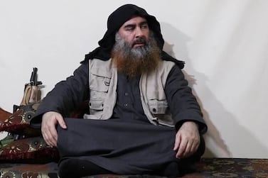 Abu Bakr Al Baghdadi' as he purportedly appeared in a video released on April 29. EPA