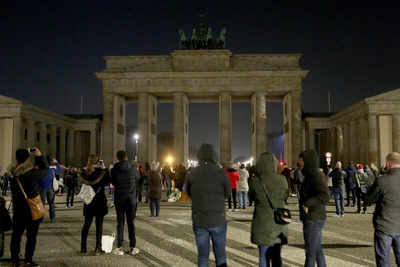 The Brandenburg Gate in Berlin, Germany is seen just after being dimmed during Earth Hour. Adam Berry / Getty Images