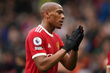 FILE - Manchester United's Anthony Martial applauds fan as he walks off the pitch at half-time, during the English Premier League soccer match between Manchester United and Everton, at Old Trafford, Manchester, England, Saturday, Oct.  2, 2021.  Martial has told Manchester United he wants to leave.  The France forward has dropped down the pecking order at Old Trafford.  He has made just two Premier League starts this season and only four in all competitions.  (Dave Thompson, Pool via AP, File)