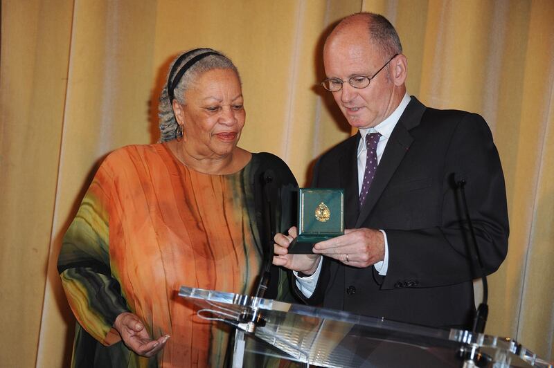 PARIS - NOVEMBER 04:  US Author and Nobel Prize in literature winner Toni Morrison (L) receives the Honor Medal of The City of Paris (Grand Vermeil) from Christophe Girard (R) at Mairie de Paris on November 4, 2010 in Paris, France.  (Photo by Francois Durand/Getty Images)