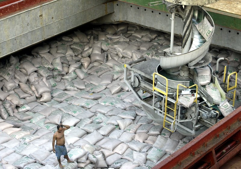 Sacks of sugar are loaded onto a ship at Brazil's main ocean port in Santos. Reuters