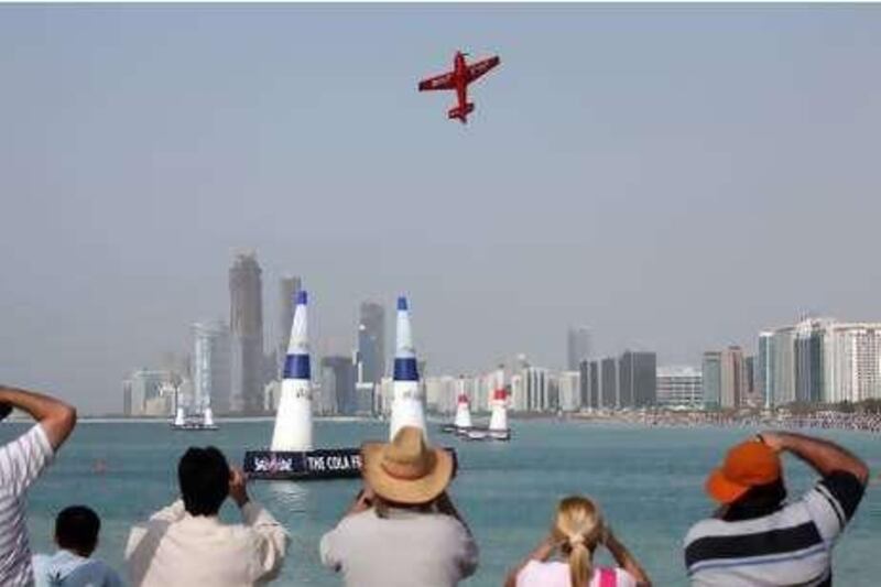 March 26, 2010 / Spectators which as the Redbull Air Racers take to the skies during the first of two days of competition on the Abu Dhabi Corniche March 26, 2010.(Sammy Dallal / The National)