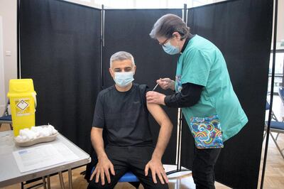 Mayor of London Sadiq Khan receives his first dose of the Pfizer vaccine from Dr. Sue Clarke at a COVID-19 vaccination clinic at the Mitcham Lane Baptist Church, south London. Picture date: Friday February 19, 2021. (Photo by Stefan Rousseau/PA Images via Getty Images)