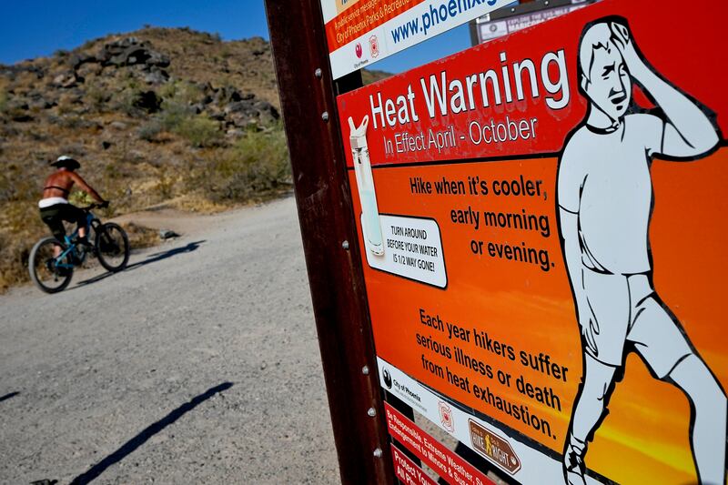 A sign warns of high high temperatures in Phoenix, Arizona. AP