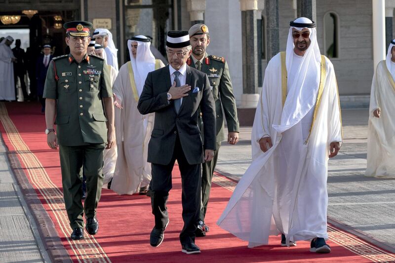 ABU DHABI, UNITED ARAB EMIRATES - June 14, 2019: HH Sheikh Mohamed bin Zayed Al Nahyan, Crown Prince of Abu Dhabi and Deputy Supreme Commander of the UAE Armed Forces (R) bids farewell to HM King Sultan Abdullah Sultan Ahmad Shah of Malaysia (2nd R), at the Presidential Airport.

( Hamad Al Kaabi / Ministry of Presidential Affairs )​
---