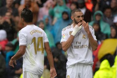Real Madrid's French forward Karim Benzema celebrates after scoring during the Spanish league football match Real Madrid CF against Levante UD at the Santiago Bernabeu stadium in Madrid on September 14, 2019. / AFP / CURTO DE LA TORRE