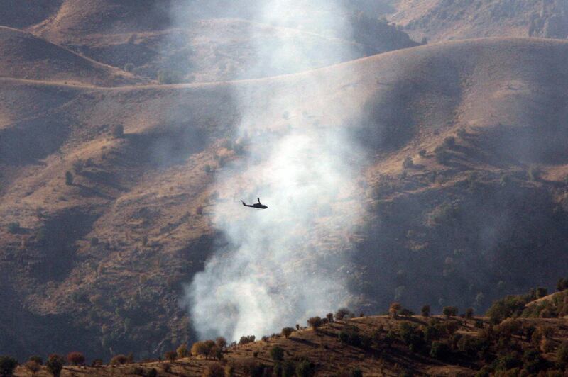 A Turkish helicopter flies over the Cudi Mountains during an attack on an outlawed PKK camp October 30, 2007, in Sirnak province, near the Iraq border. AFP