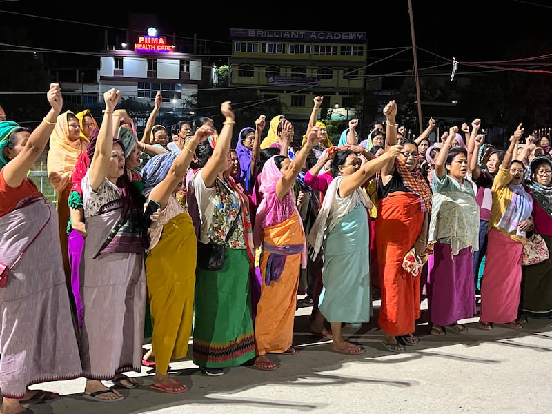 Women of the Meria Paibis stage a night vigil to protect their community in Thoubal district, Manipur. Taniya Dutta/ The National