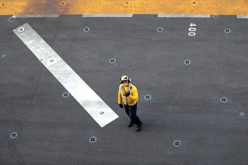 A US sailor is seen on the deck.