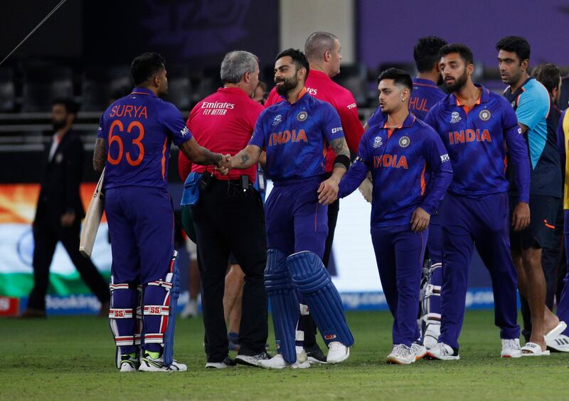 Virat Kohli shakes hands with Suryakumar Yadav after the match. Reuters