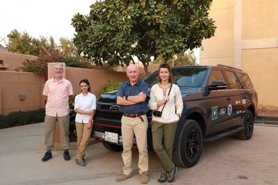 Alan Morrissey, Reem Philby, Mark Evans and Ana-Maria Pavalache stand in front of one of the support vehicles for the Heart of Arabia expedition. Osama Farhan / British Embassy Riyadh