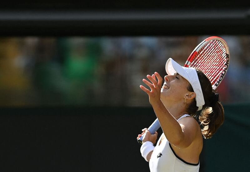 France's Alize Cornet celebrates beating Poland's Iga Swiatek in the third round at Wimbledon on July 2, 2022. AFP