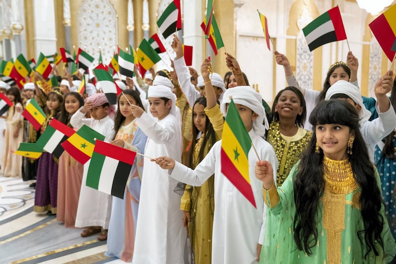ABU DHABI, UNITED ARAB EMIRATES - February 06, 2020: School children participate during official reception, hosted for HE Macky Sall, President of Senegal (not shown), at Qasr Al Watan.

( Hamad Al Kaabi / Ministry of Presidential Affairs )​
---