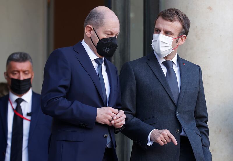 French President Emmanuel Macron, right, and new Chancellor of Germany Olaf Scholz called for dialogue amid Russia-Ukraine tensions. EPA