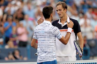 Daniil Medvedev, right, will play his second Masters final in eight days having beaten Novak Djokovic in Mason on Saturday night. Matthew Stockman / Getty Images