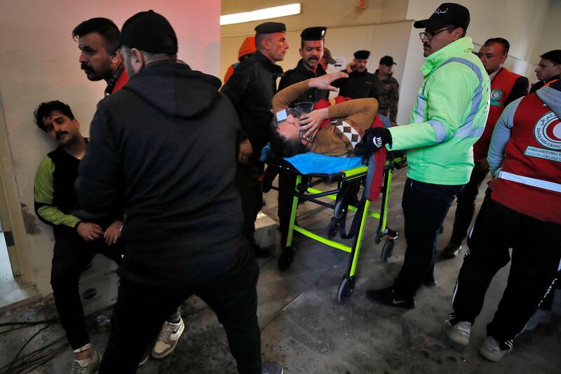 Injured fans receiving treatment. AFP