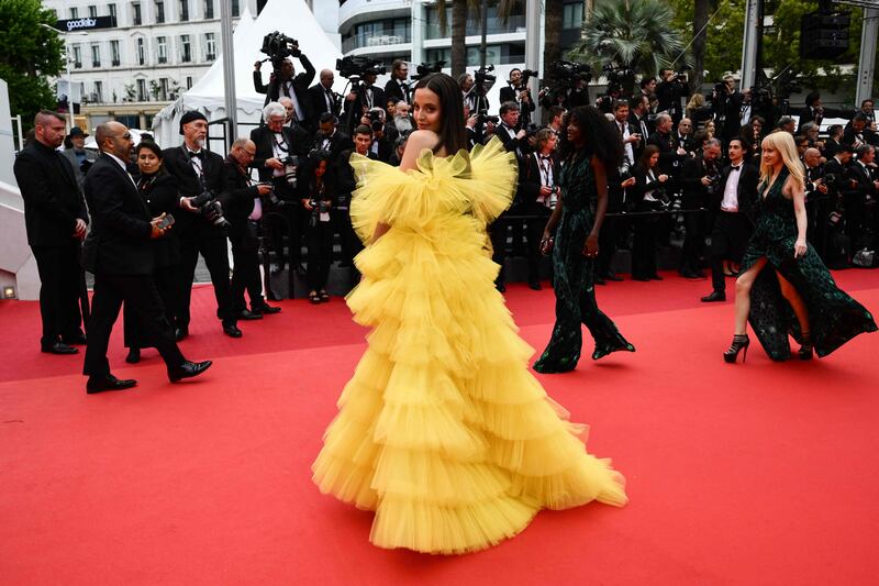 Spanish fashion influencer Marta Sierra wears sunshine yellow. AFP
