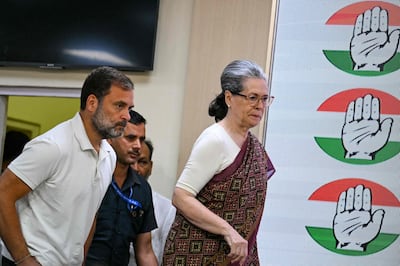 Indian National Congress leaders Rahul Gandhi and Sonia Gandhi arrive for a press conference at party headquarters in New Delhi on Thursday. AFP