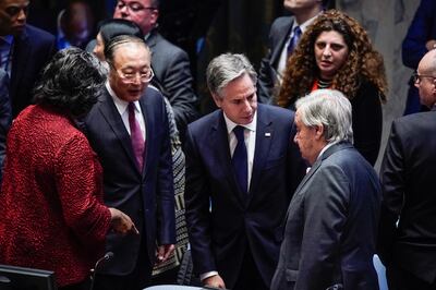 US Secretary of State Antony Blinken speaks to UN Secretary General Antonio Guterres, Zhang Jun, the Chinese ambassador to the UN, and Linda Thomas-Greenfield, the US ambassador to the UN, in New York last month. EPA