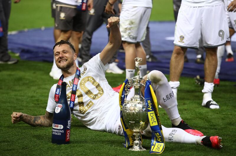 Leed's United's Liam Cooper with the trophy. PA