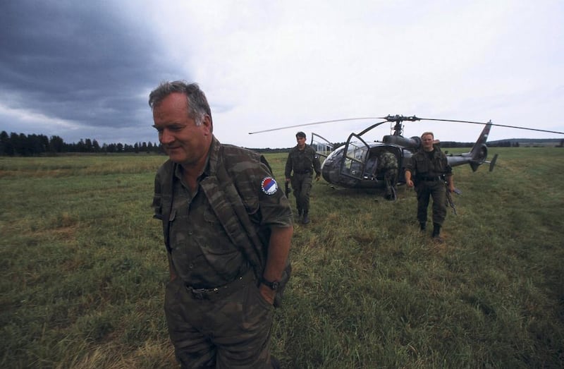 Bosnian Serb general Ratko Mladic in 1995. After eluding capture for 14 years, he was arrested in 2011 and jailed for life for genocide, war crimes and crimes against humanity. Mladic was responsible for the Srebrenica massacre, in which up to 8,000 Muslim men and boys were murdered. Pool Zambounis / Zamur / Gamma Rapho / Getty Images