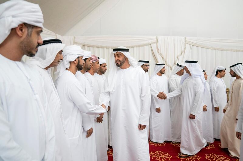 SHAWAMEKH, ABU DHABI, UNITED ARAB EMIRATES - September 15, 2019: HH Sheikh Mohamed bin Zayed Al Nahyan, Crown Prince of Abu Dhabi and Deputy Supreme Commander of the UAE Armed Forces (R), offers condolences for martyr Warrant Officer Zayed Musllam Suhail Al Amri.

( Mohamed Al Hammadi / Ministry of Presidential Affairs )
---