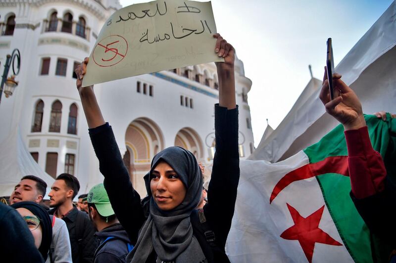 Algerian students demonstrate in the capital Algiers on March 5, 2019 against ailing President Abdelaziz Bouteflika's bid for a fifth term. Algerians yesterday dismissed President Abdelaziz Bouteflika's promise to quit early if re-elected for a fifth time in April and eyed fresh protests to push him from office. The ailing leader, who suffered a stroke in 2013, vowed in a letter read out on state television late Sunday to organise a "national conference" that would set a date for further polls which he would not contest.
 / AFP / RYAD KRAMDI                        
