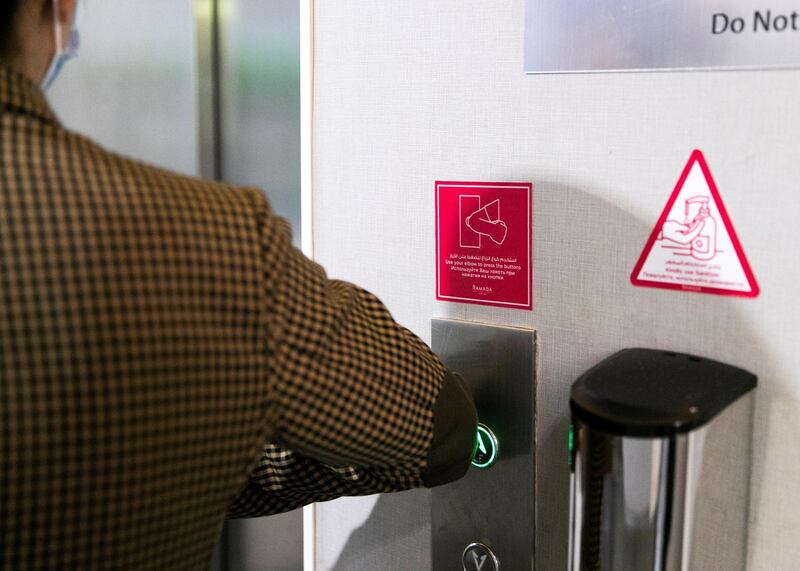 DUBAI, UNITED ARAB EMIRATES. 11 OCTOBER 2020. 
Residents are required to use their elbows for the elevator buttons at Ramada Hotel and Suites by Wyndham Dubai JBR.

(Photo: Reem Mohammed/The National)

Reporter:
Section:
