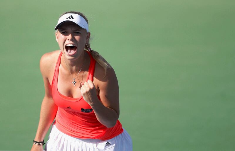 Caroline Wozniacki of Denmark reacts after winning her quarter-final match against Shahar Peer of Israel during the WTA Dubai Tennis Championships February 18, 2011. REUTERS/Jumana El-Heloueh (UNITED ARAB EMIRATES - Tags: SPORT TENNIS) *** Local Caption ***  DUB07_TENNIS-WOMEN-_0218_11.JPG