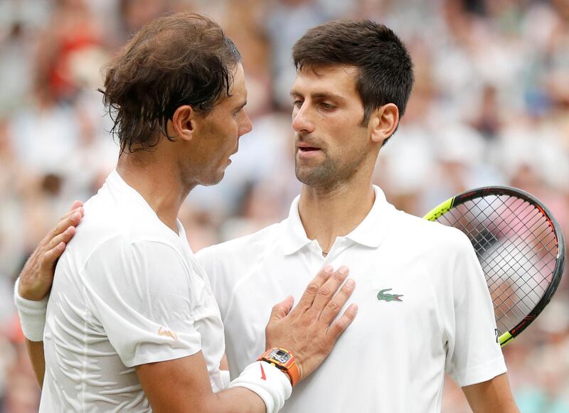 FILE PHOTO: Tennis - Wimbledon - All England Lawn Tennis and Croquet Club, London, Britain - July 14, 2018  Serbia's Novak Djokovic celebrates winning his semi final match against Spain's Rafael Nadal   Pool via Reuters/File Photo